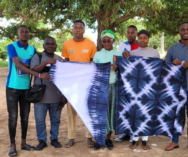 DAMAX Research team with Youth Savings and Loan Association (YSLA) members Ndala Nzega, Tabora region.