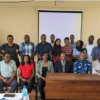 Acting Vice Chancellor for Hurbet Kairuki Memorial University, Professor Godwin Ndossi (seated on the center), officiating a four-days Research Fellow’s training for an HIV prevalence study in Nyarugusu and Nduta refugees camps in Kigoma Tanzania.